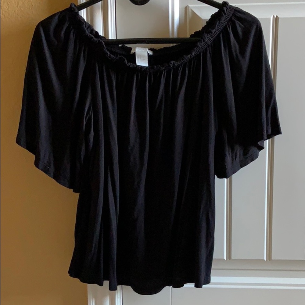 black off-the-shoulder h&m top with ruffles
